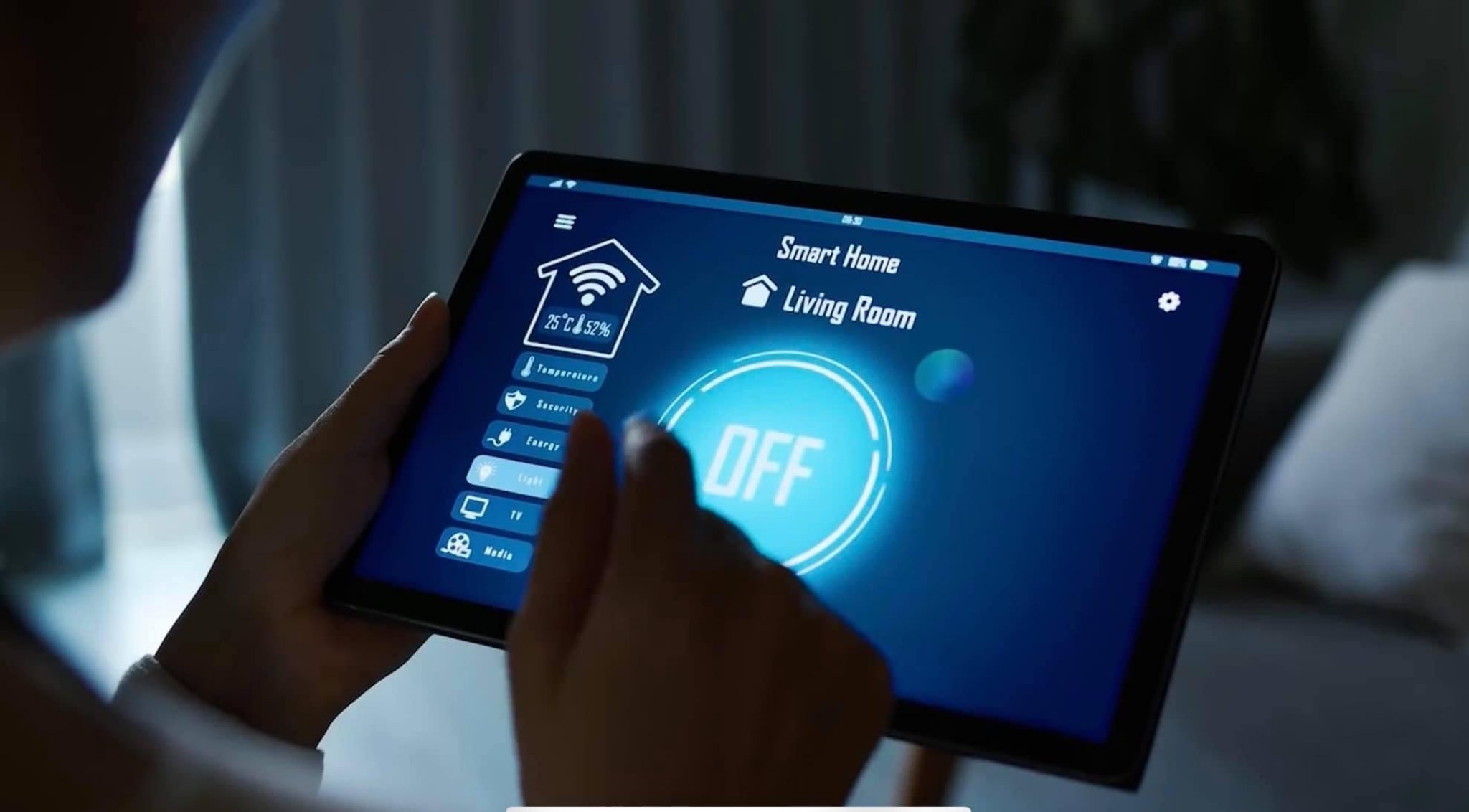Smart home control panel inside Happy One Mori apartment living room.